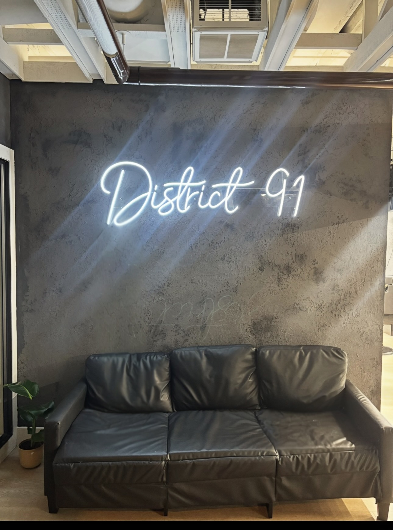 District 91 neon sign and lounge